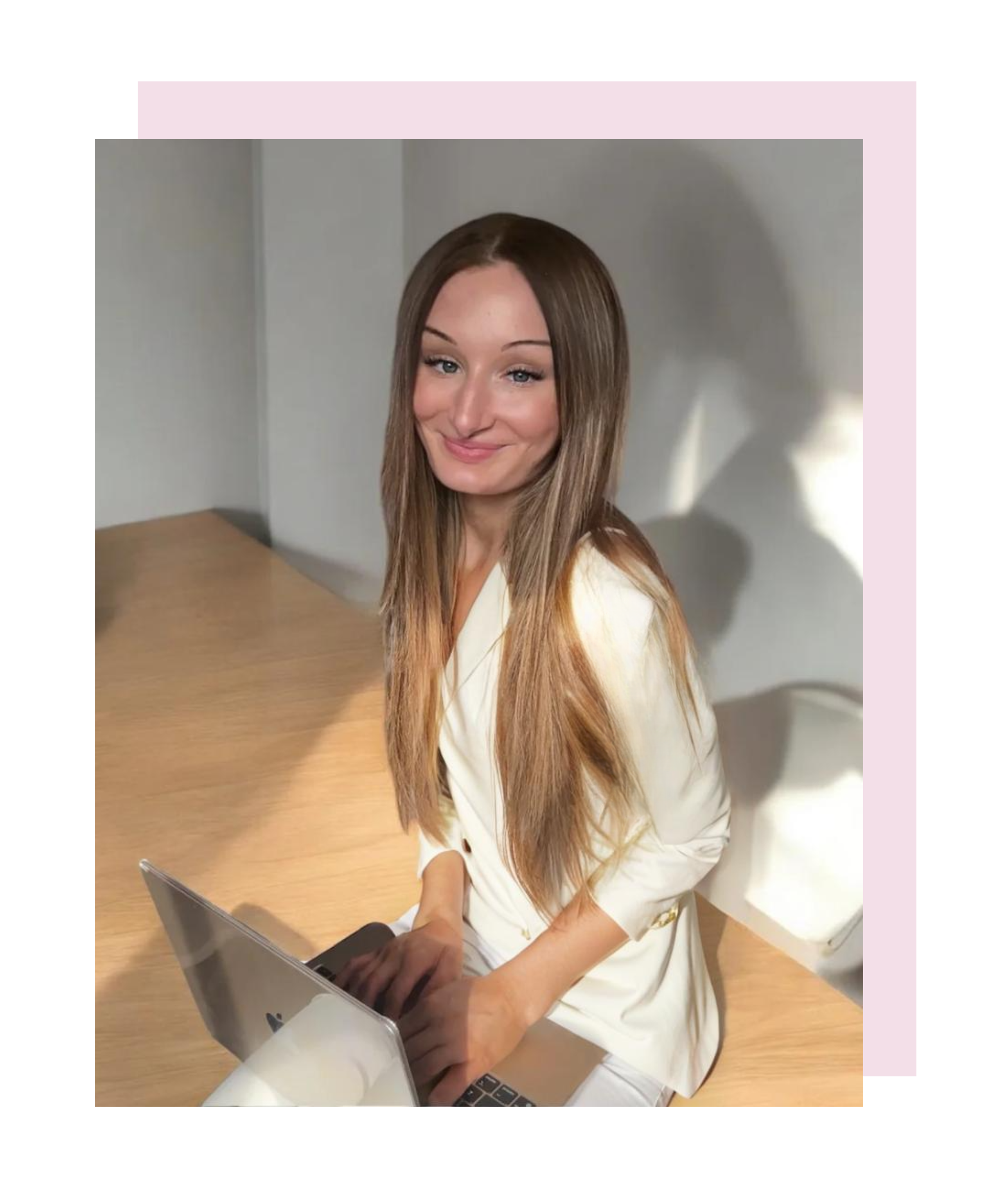 Liz McCuan, founder of MBL Marketing, seated with laptop in natural light, showcasing her role as a digital marketing strategist and social media expert for service-based businesses.